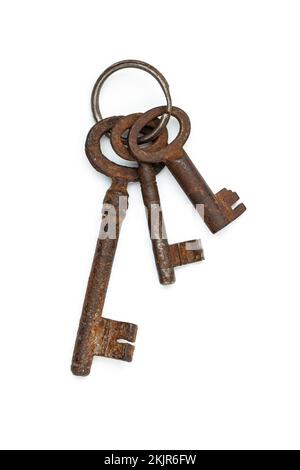 Bunch of old vintage keys isolated on white background. Safety and security concept. Stock Photo