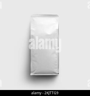Template of a white sealed bag for coffee beans, packaging with a clamping tape, isolated on a wall background. Mockup stabilo doypack with tea, pack Stock Photo