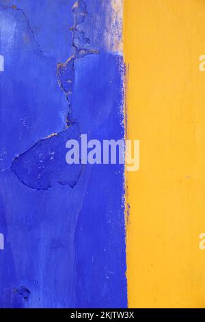 Blue and Yellow painted wall for background use. Stock Photo