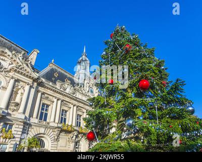Traditional Christmas tree in front of the Hotel de Ville (town hall) in Tours, Indre-et-Loire (37), France. Stock Photo