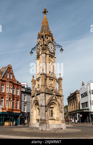 The Mallock Memorial Clock Tower in Torquay, UK is a Grade II listed building made from sandstone and was designed by John Donkin. Stock Photo