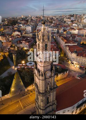 Aerial view of the 18th-century Clerigos Tower (Portuguese: Torre dos Clerigos) at dusk in Porto (Oporto), Portugal. Stock Photo