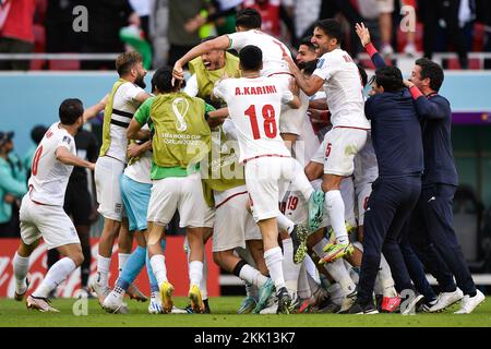 Doha, Qatar. 25th Nov, 2022. DOHA, QATAR - NOVEMBER 25: Roozbeh Cheshmi of IR Iran celebrates after scoring his sides first goal with Hossein Hosseini of IR Iran, Milad Mohammadi of IR Iran, Morteza Pouraliganji of IR Iran, Majid Hosseini of IR Iran, Ramin Rezaeian of IR Iran, Ehsan Haji Safi of IR Iran, Saeid Ezatolahi of IR Iran, Ahmad Noorollahi of IR Iran, Mehdi Taremi of IR Iran, Ali Gholizadeh of IR Iran, Sardar Azmoun of IR Iran, Payam Niazmand of IR Iran, Amir Abedzadeh of IR Iran, Sadegh Moharrami of IR Iran, Shojae Khalilzadeh of IR Iran, Alireza Jahanbakhsh of IR Iran, Karim Ansarif Stock Photo