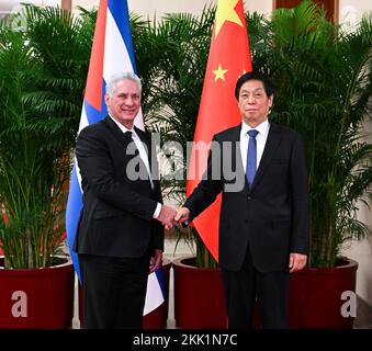 Beijing, China. 25th Nov, 2022. Li Zhanshu, chairman of the National People's Congress (NPC) Standing Committee, meets with Miguel Diaz-Canel Bermudez, first secretary of the Central Committee of the Communist Party of Cuba and Cuban president, at the Great Hall of the People in Beijing, capital of China, Nov. 25, 2022. Credit: Rao Aimin/Xinhua/Alamy Live News Stock Photo