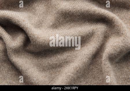Fine grey cashmere texture close-up. Warm cashmere fabric as background, top view Stock Photo