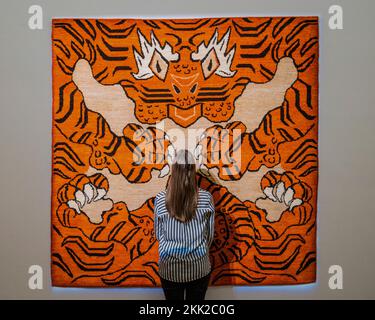London, UK. 25th Nov, 2022. Ai Weiwei's rug The Tyger - Tomorrow's Tigers, A Selling Exhibition Co-Hosted by Sotheby's and WWF. It Features Specially Commissioned, Limited-Edition Art Rugs by Major International Artists. Profits from all sales will go to help WWF and the TX2 goal and the Exhibition will run from 24-29 November 2022. Credit: Guy Bell/Alamy Live News Stock Photo