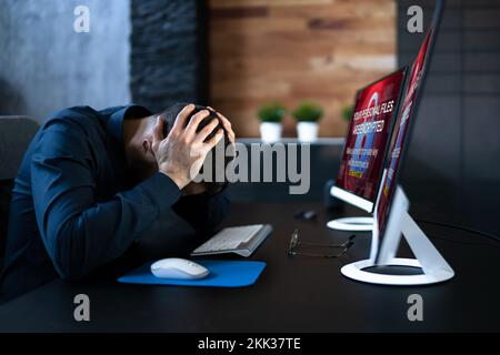 Ransomware Malware Cyber Attack On Business Computer Stock Photo