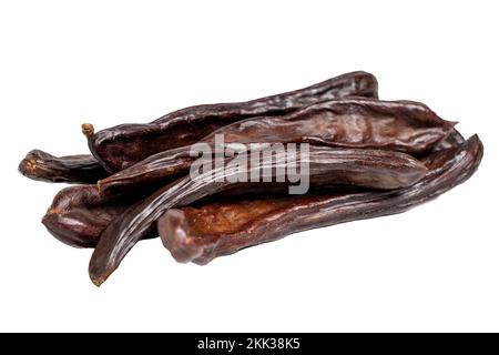 Carob isolated on a white background. healthy food. close up Stock Photo