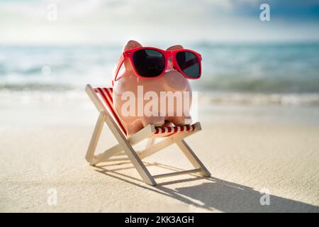 Pink Piggy Bank Object On Vacation At Beach Stock Photo