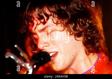 RAZORLIGHT, YOUNG, EARLY PUB GIG, 2004: A young Johnny Burrell singer/guitars of RAZORLIGHT at the Barfly in Cardiff, January 22 2004. Photograph: ROB WATKINS.   INFO: Razorlight is a British rock band formed in 2002, known for their energetic sound and catchy melodies. Led by Johnny Borrell, they gained prominence with hits like 'America' and 'In the Morning,' and their album 'Up All Night' achieved critical and commercial success. Stock Photo