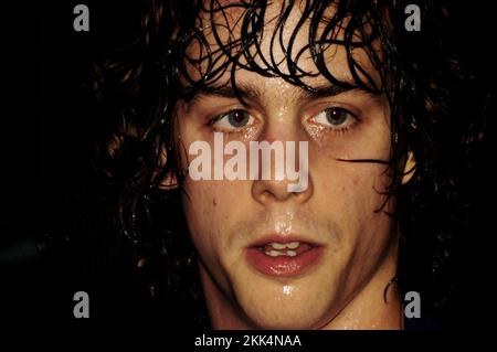 RAZORLIGHT, YOUNG, EARLY PUB GIG, 2004: A young Johnny Burrell singer/guitars of RAZORLIGHT at the Barfly in Cardiff, January 22 2004. Photograph: ROB WATKINS.   INFO: Razorlight is a British rock band formed in 2002, known for their energetic sound and catchy melodies. Led by Johnny Borrell, they gained prominence with hits like 'America' and 'In the Morning,' and their album 'Up All Night' achieved critical and commercial success. Stock Photo