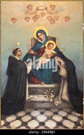 ANNECY, FRANCE - JULY 10, 2022:  The painting of  Madonna with the St. Dominic and Catherine of Siena in the church Eglise Saint Maurice by unknown ar Stock Photo