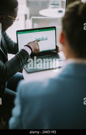 Two bussinesspeople disscussing over a topic Stock Photo