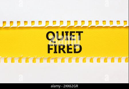 Quiet fired symbol. Concept words Quiet fired on yellow paper. Beautiful white background. Business and quiet fired concept. Copy space. Stock Photo