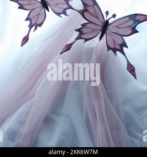 White silk background with butterfly drapery Stock Photo