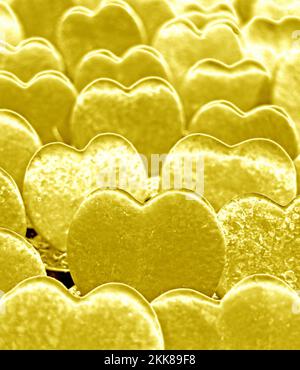Pop Art Surreal Style Rows of Glossy Golden Sweetheart Valentine Hoya Plants Stock Photo