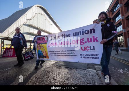 Friday the 25th of November saw a demonstration involving members of the Royal Mail  Communications Union, the University and College Union, UNISON members at Manchester Metropolitan Union and members of the National Union of Students march from Manchester University to St Peter’s Square in the city centre. The rally is part of a wave of action across the UK over claims of  inadequate pay to combat the cost of living crisis.  Picture: garyroberts/worldwidefeatures.com Credit: GaryRobertsphotography/Alamy Live News Stock Photo