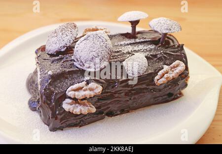 Buche de Noel cake with Christmas decoration Stock Photo - Alamy