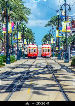 New Orleans, USA - July 17, 2013: red trolley streetcar on rail in New Orleans French Quarter Stock Photo
