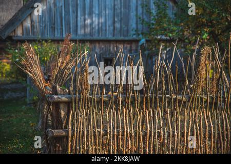 Fence made of wood stakes Stock Photo