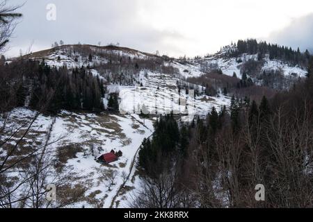 Carpathian, Romania, 2021-12-28. Beautiful romanian landascape under the snow. Stock Photo