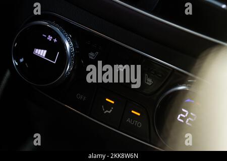 Car climate control button. Modern car heating control panel. Stock Photo