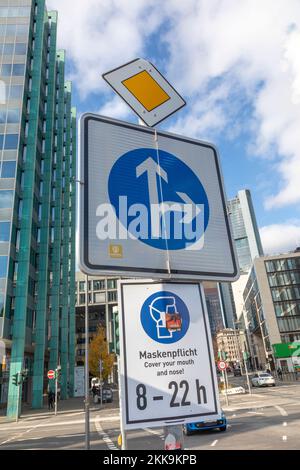 Frankfurt, Germany - October 24, 2020: signage cover your mouth and nose (Maskenpflicht) downtown Frankfurt, Germany. Stock Photo