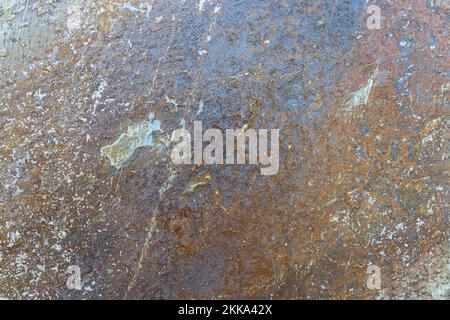 Rusty metal surface with dirt flaking and cracking texture Stock Photo