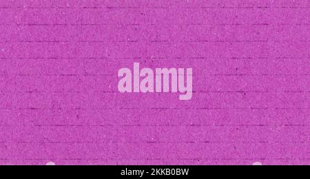 pink corrugated cardboard texture useful as a background Stock Photo