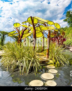 Meran, Province Bolzano/Italy - August 5, 2019: garden of love with scenic art and lake located in, Die Gaerten von Schloss Trauttmansdorff, South Tyr Stock Photo