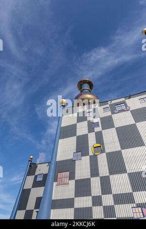 Vienna, Austria - Feb 16, 2019: Spittelau waste incineration plant of the city Vienna (in German Fernwarme Wien) designed by Hundertwasser. Stock Photo