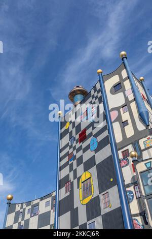 Vienna, Austria - Feb 16, 2019: Spittelau waste incineration plant of the city Vienna (in German Fernwarme Wien) designed by Hundertwasser. Stock Photo