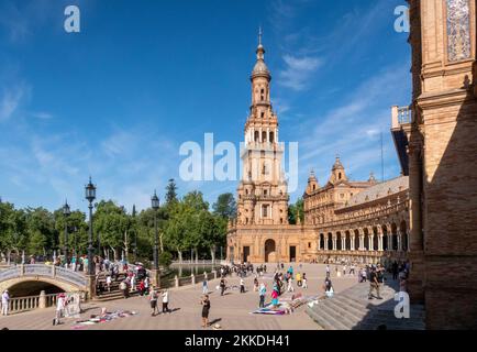 Sevilla, Spain - MAY 23, 2019: people enjoy the summer day at beautiful Plaza de Espana in Seville. Andalusia, Spain. Stock Photo