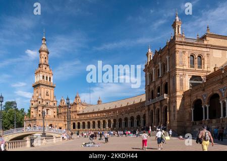 Sevilla, Spain - MAY 23, 2019: people enjoy the summer day at beautiful Plaza de Espana in Seville. Andalusia, Spain. Stock Photo