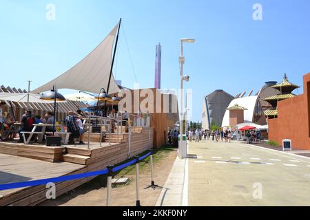 Milan, Italy - June 30, 2015: Panoramic view of the Expo Milan 2015 internal large road with the Belgian pavilion on the left. Stock Photo