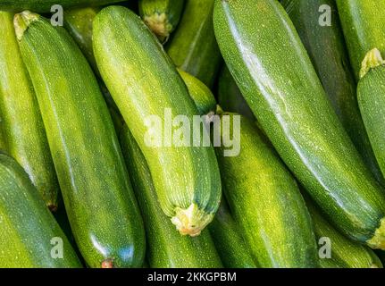 Fresh green Cucumbers filling the frame Stock Photo