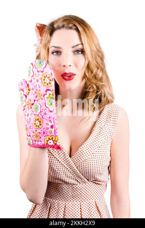 Retro pinup girl covering mouth with heat resistant mitt. Cookery secrets and handy tips Stock Photo