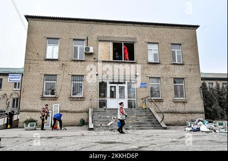 VILNIANSK, UKRAINE - NOVEMBER 23, 2022 - Workers remove the rubble at the maternity ward of the Vilniansk Multidisciplinary Hospital destroyed in a mi Stock Photo