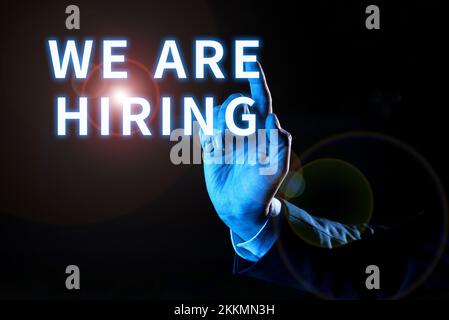 Hand writing sign We Are Hiring. Conceptual photo pay someone to do a particular job for company in future Stock Photo