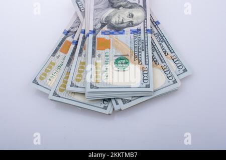 American 100 dollar banknote bundles placed on white background Stock Photo