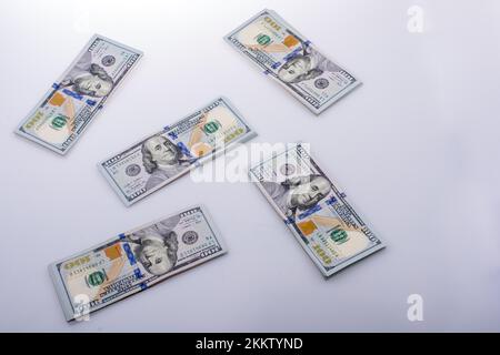 American 100 dollar banknote bundles placed on white background Stock Photo