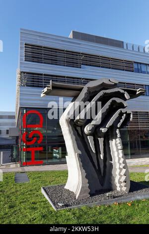 Düsseldorf University of Applied Sciences, HSD, sculpture Hand with Drawing Pencil by Klaus Kammerich, Derendorf Campus, Düsseldorf, North Rhine-Westp Stock Photo