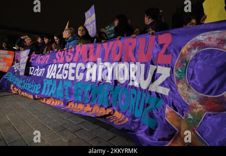 The banner unfurled at the International Day for the Elimination of Violence Against Women in Istanbul. The women marched. Stock Photo