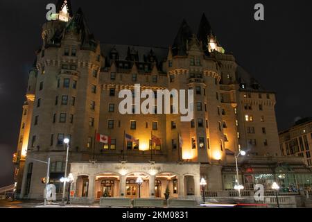 The Fairmont Château Laurier, a national historic site, first opening 1912 is seen lit in the early morning hours in Ottawa. Stock Photo