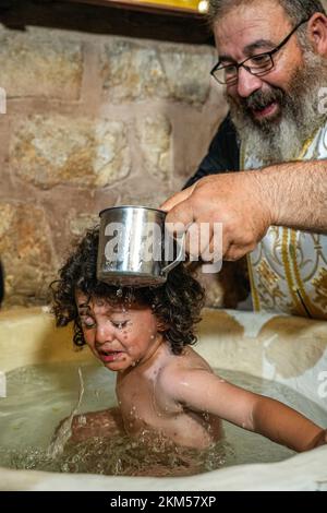 High Quality photos from baptism in very old church in Jordan Stock Photo