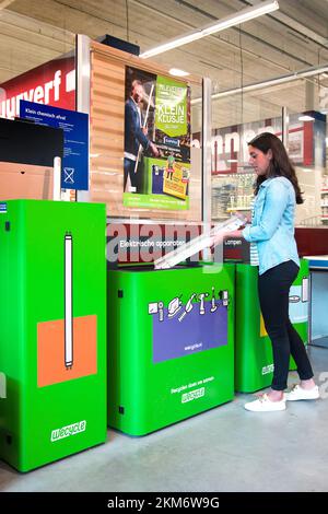 Collecting fluorescent tubes in a construction market for recycling. Holland. vvbvanbree fotografie Stock Photo