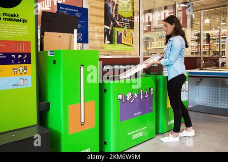 Collecting fluorescent tubes in a construction market for recycling. Holland. vvbvanbree fotografie Stock Photo