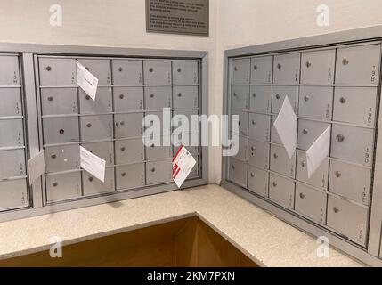 Misdelivered mail in the mailroom of an apartment building in New York on Tuesday, November 15, 2022. (© Frances M. Robert) Stock Photo