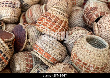 Traditional wicker baskets, exhibited in market shops of the old town Nizwa. Oman. Arabian Peninsula. Stock Photo