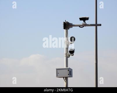 A roadside speed safety camera for supervision of the highways to detect and record the vehicles on the roads and the authority can catch the above sp Stock Photo